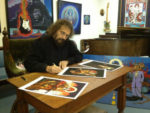 Stanley Mouse signing the fine art prints.